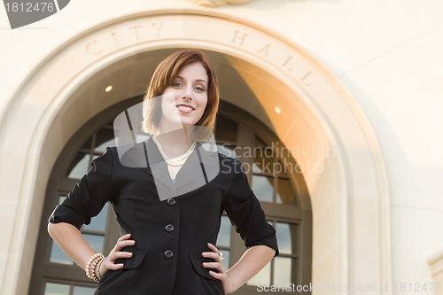 Image of Young Pretty Businesswoman Outside in Front of City Hall