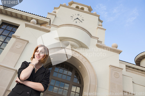 Image of Young Pretty Businesswoman Outside in Front of City Hall