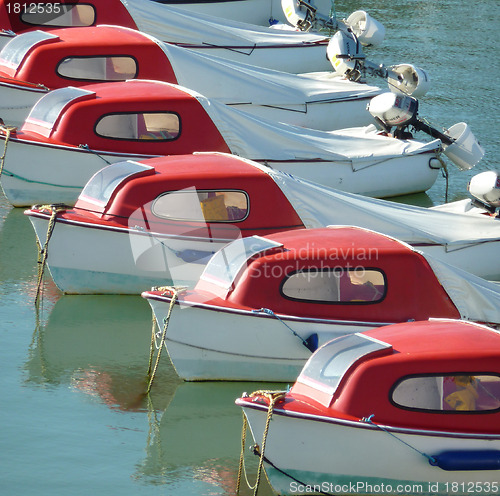 Image of Red & white boats