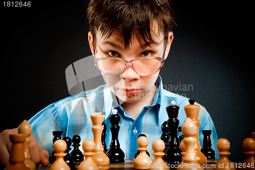 Image of wunderkind  play chess