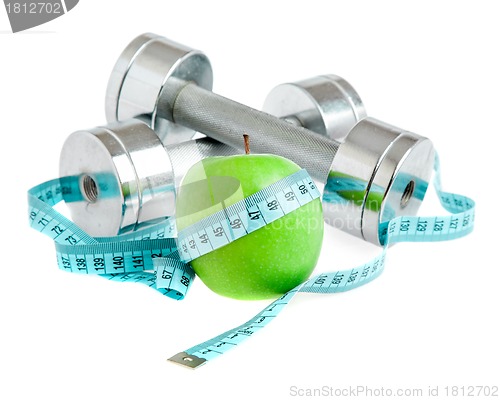 Image of Dumbbells and apple. A healthy way of life