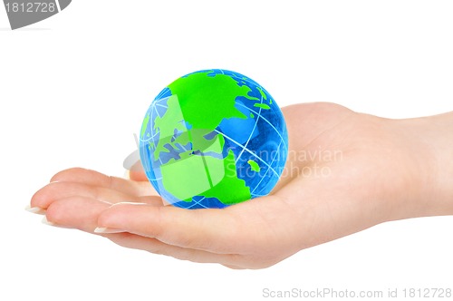 Image of hand of the person holds globe