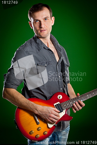 Image of man with a guitar