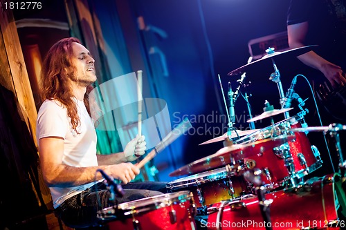 Image of playing drums