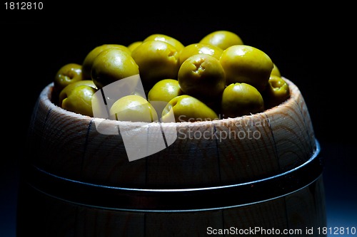 Image of olive in small barrel