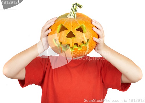 Image of  boy with jack-o-lantern. halloween.