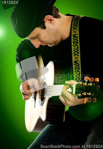 Image of man with a guitar