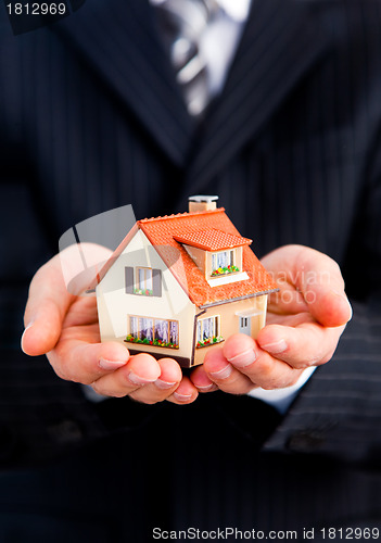 Image of house in a hand