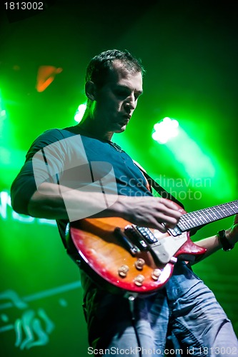 Image of man with a guitar