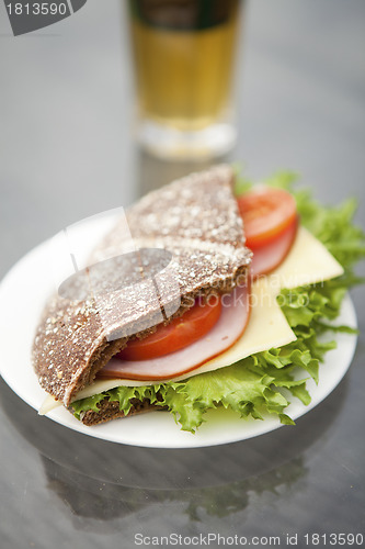 Image of Ham, cheese and tomato sandwich
