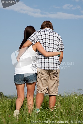 Image of young love couple smiling outdoor in summer 