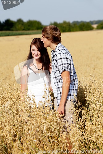 Image of happy couple in love outdoor in summer on field