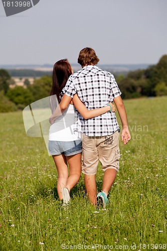 Image of young love couple smiling outdoor in summer 