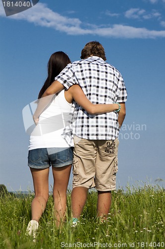 Image of young love couple smiling outdoor in summer 