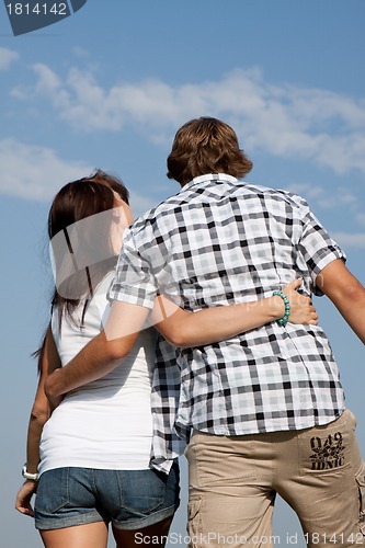 Image of young love couple smiling outdoor in summer 