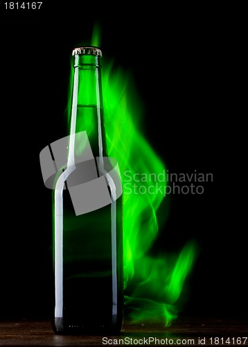 Image of Beer bottle with color fire