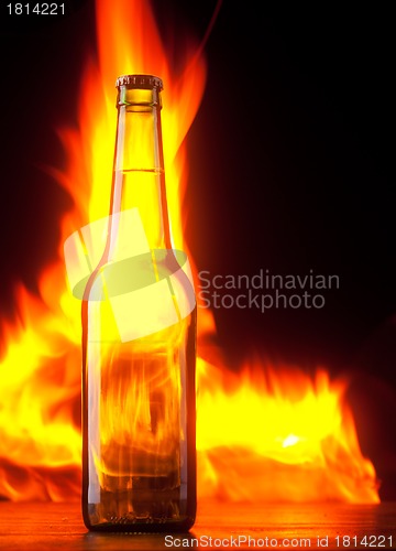 Image of Beer bottle with color fire