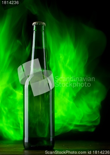 Image of Beer bottle with color fire