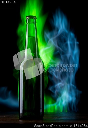 Image of Beer bottle with color fire
