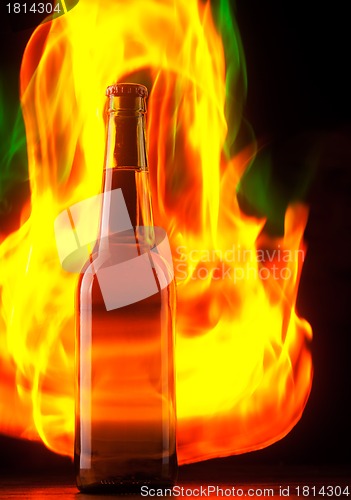 Image of Beer bottle with color fire