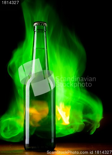 Image of Beer bottle with color fire