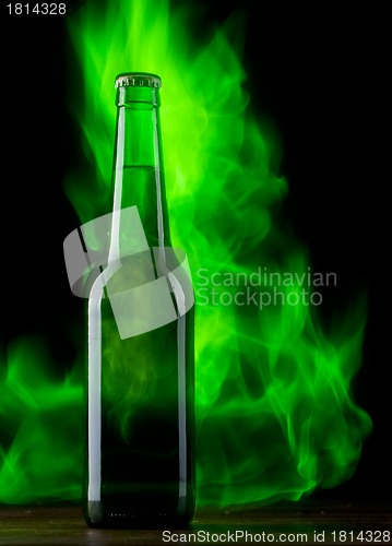 Image of Beer bottle with color fire