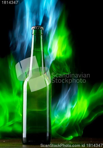 Image of Beer bottle with color fire