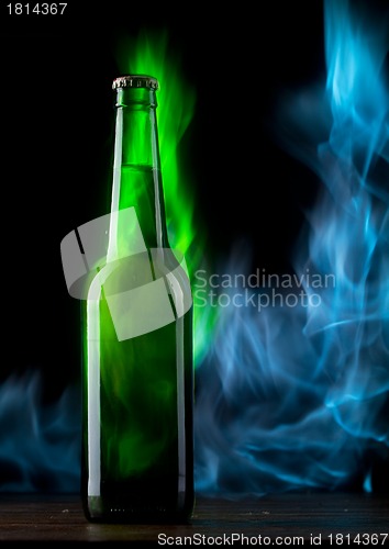 Image of Beer bottle with color fire