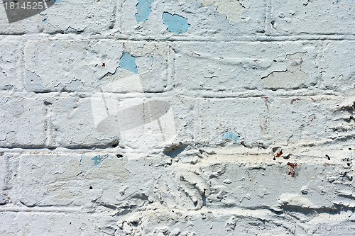 Image of white textured brick wall painted