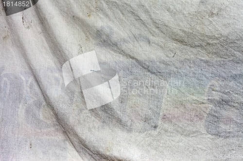 Image of Old dirty white fabric with waves