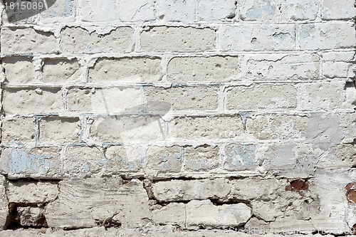 Image of white textured brick wall painted