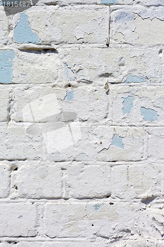 Image of white textured brick wall painted