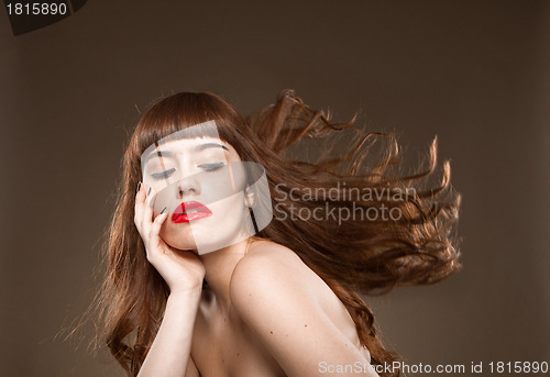 Image of Sassy brunette with red lips