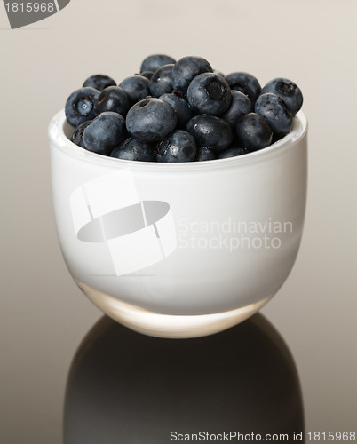 Image of White glass bowl full of blueberries