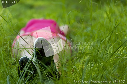 Image of Girl lying on grass
