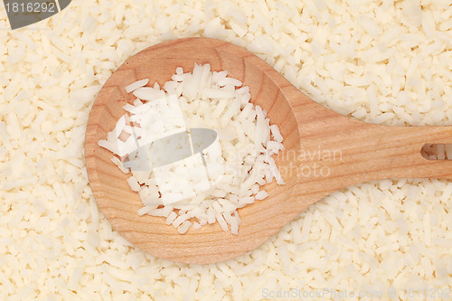 Image of Rice on a wooden spoon