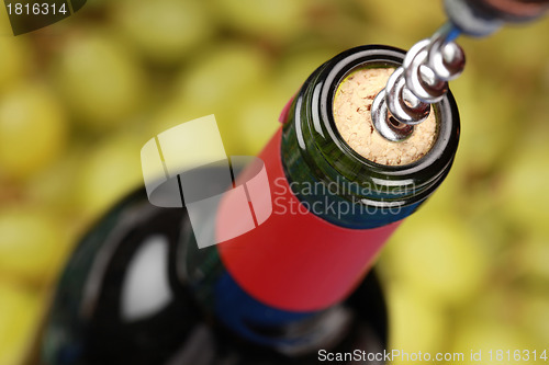 Image of Opening a wine bottle