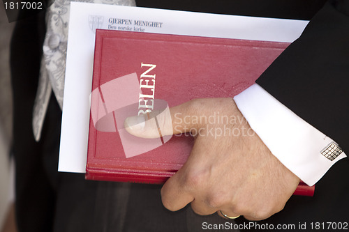 Image of Groom with bible