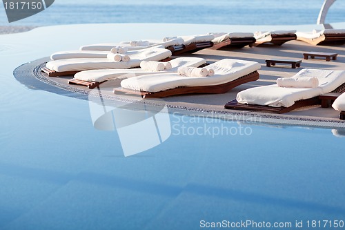 Image of sunbeds by the pool