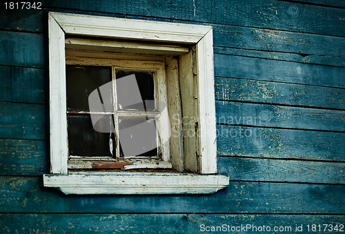 Image of Blue wooden wall, window