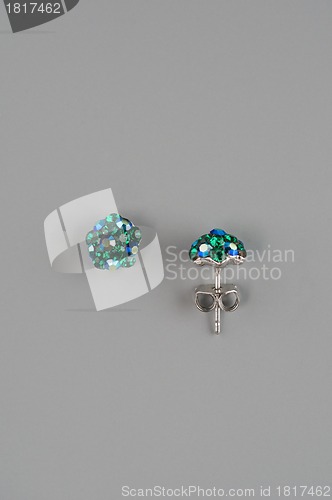 Image of Woman earrings with green gem