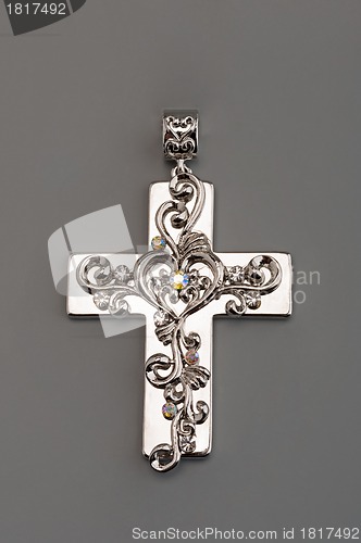 Image of Silver cross on gray