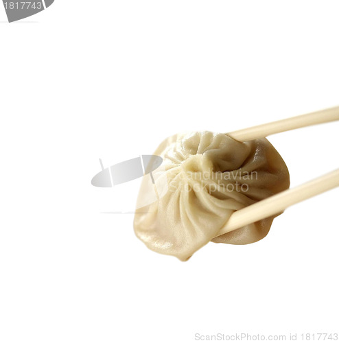 Image of Ravioli with chopsticks isolated