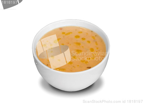 Image of Plate of soup on white background