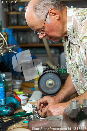 Image of Senior working in workshop