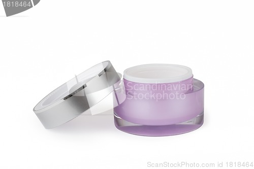 Image of purple container of cream on white background