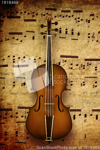 Image of violin on note background