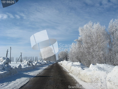 Image of Beautiful winter landscape with hoar-frost on the road