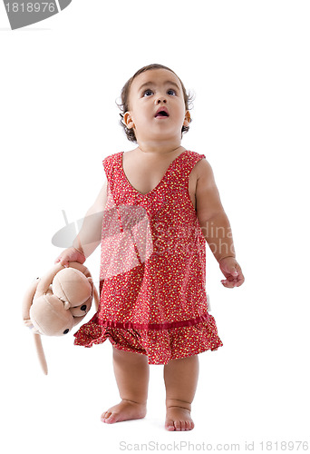 Image of cute little girl looking up