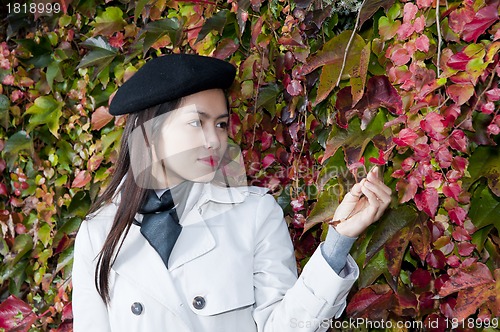 Image of pretty woman in autumn